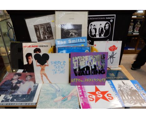 A box of new wave, early electronic, indie and rock LP and extended play 12" vinyl records to include Sky, NRBQ, Dum Dum Boys