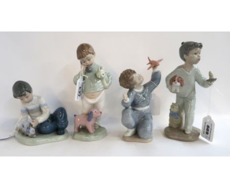 Four Nao figures of boys with soft toys and teddies Condition Report: Boy holding candle has had arm broken and stuck back on