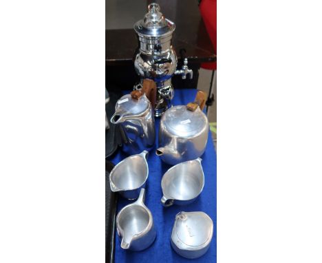 Picquotware teawares comprising teapot, hot water pot, two milk jugs and sugar bowls together with a chromed coffee pot Condi