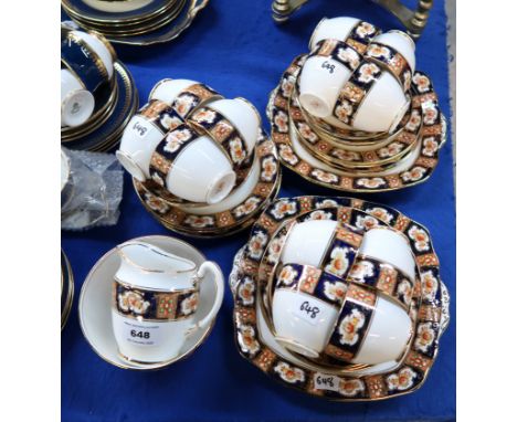 A Royal Albert Imari palette teaset comprising twelve cups, saucers, plates, two cake plates, milk jug and sugar bowl Conditi