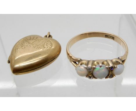 An 18ct opal and diamond ring, size S1/2, weight 2.9gms and a 9ct back &amp; front locket Condition Report: Available upon re