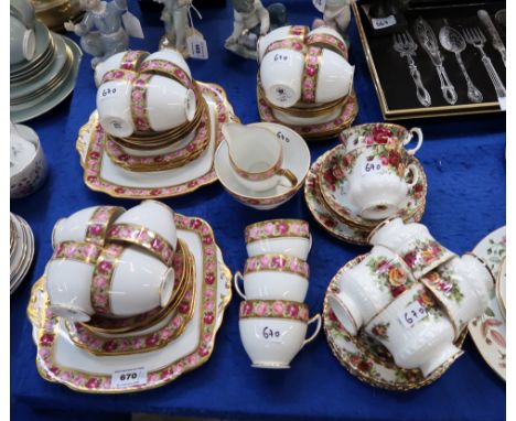 A Standard China rose decorated teaset comprising fifteen cups, twelve saucers, eleven plates, two cake plates, milk jug, sug