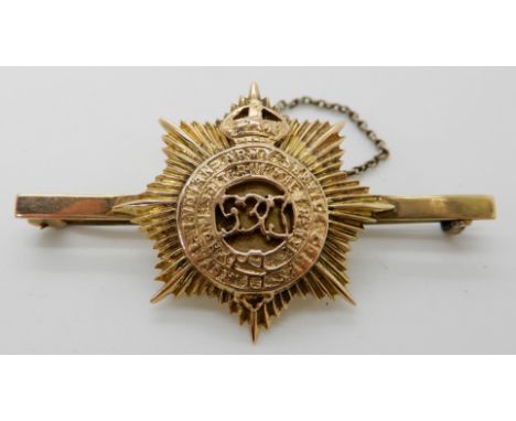 A yellow metal Royal Indian Army Service Corps sweetheart brooch, length 5.1cm weight 9.4gms Condition Report: Available upon