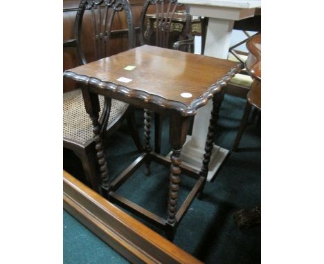 AN OAK TABLE c.1950 the shaped moulded top raised on spiral twist supports and turned legs 74cm (h) x 45cm (w) x 45cm (d) tog