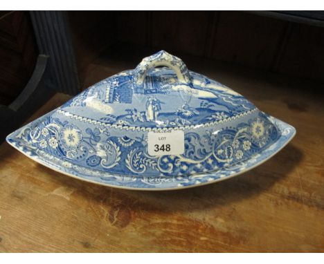 A PAIR OF BLUE AND WHITE CHINA TUREENS of oval outline decorated with figures in a landscape inscribed "W R Midwinter England