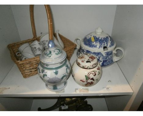 Shelf of pottery inc ginger jar, tea set and blue and white tureen