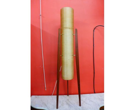 A teak rocket lamp 