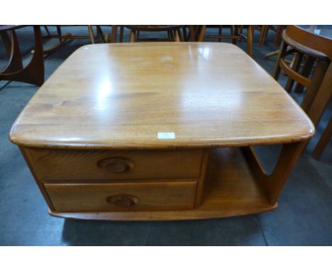 An Ercol Blonde Pandoras Box coffee table 