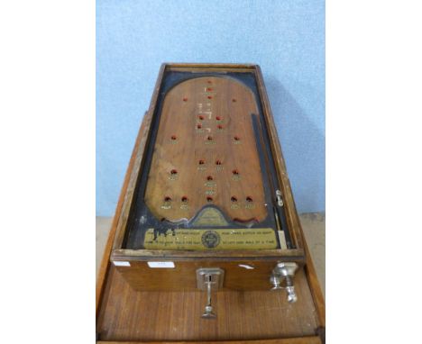 An early 20th Century The Advance Pin Table bagatelle 