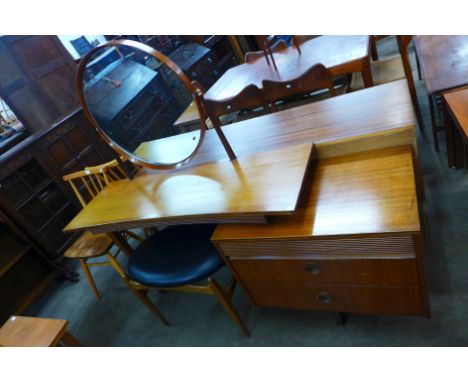 A teak dressing table with stool 
