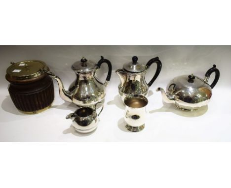 A silver plated tea pot, ebonised handle and finial; a similar coffee pot; a silver plated hot water jug; a turned wooden bis