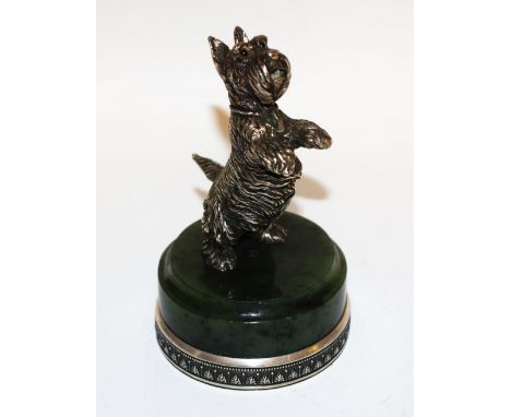 A Russian silver and nephrite jade model, of a rearing Scottish terrier, turned plinth outlined with a silver beaded anthemio