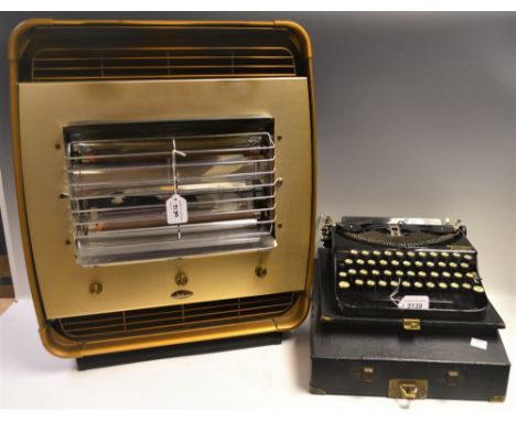 An early 20th century Remington Portable typewriter, c.1925, cased; a Belling 854 floor standing electric heater, c.1960 (2)