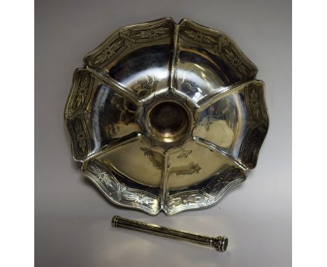 A silver ink well stand of flower head form, chased decoration, inscribed, dated 1868; a silver dip pen, seal end, Birmingham