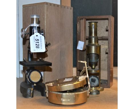 A student brass microscope; an Iveco microscope; a brass marine compass (3)