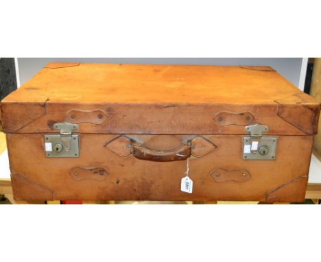 A fully tanned buffalo hide travelling trunk, Honorcraft, by Rubin Moses and Sons, 7-9 Commercial Street, Bangalore, 82cm wid