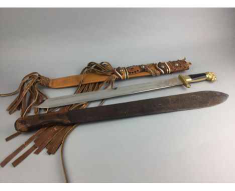 EARLY 20TH CENTURY MACHETE, 66cm long, along with another machete, an African ebony carved stick, a boomerang, a paddle and a