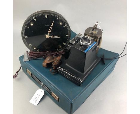 VINTAGE TYPEWRITER, in carry case, along with a carriage clock, another clock, Kodak camera, Poloroid Colorpack II and a case