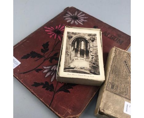 ALBUM OF VINTAGE POSTCARDS, including comedy, landscape and some glamour, contained in a floral decorated cloth album with a 