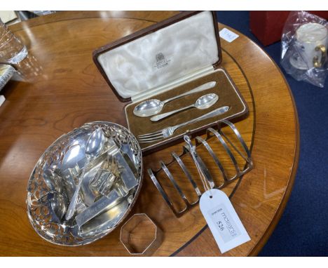 SILVER SEVEN BAR TOAST RACK, 11cm wide, along with a pierced silver circular bowl, Muirfield Golf Club (1961) ashtray, napkin