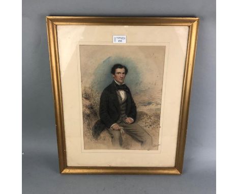 19TH CENTURY WATERCOLOUR PORTRAIT, of a young gentleman, seated in a landscape, 36cm x 26cm,framed and glazed
