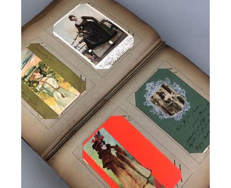 ALBUM OF VINTAGE POSTCARDS, U.K. and European land and towns-capes, some comedy and glamour, contained in cherub decorated cl