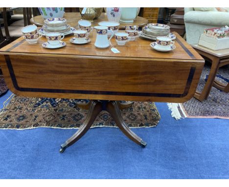 LATE REGENCY MAHOGANY PEMBROKE TEA TABLE, 96cm wide, the crossbanded top with single frieze drawer, on central pillar with qu