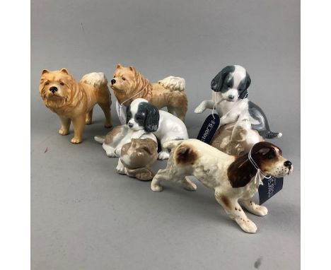 BESWICK FIGURE OF A SPANIEL, 15cm long, along with two Nao figures of dogs and two other ceramic dogs (5)