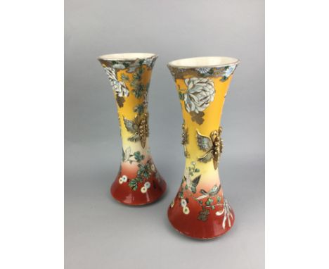 PAIR OF EARLY 20TH CENTURY JAPANESE TRUMPET VASES, 38cm high, decorated with butterflies in relief and with flowers, along wi