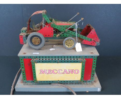 Scratch built Meccano Tractor with Shovel with electrical fittings on stand, 15 x 10" and 14" in height, grubby 