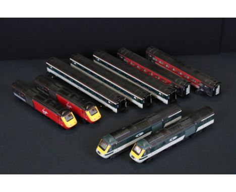 Two Hornby train pack sets to include Virgin Maiden Voyager / Lady in Red and Great Western Techniquest, 9 items, one locomot