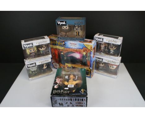Five boxed Funko Vynl. Harry Potter collectibles to include Rubeus Hagrid &amp; Harry Potter, Dobby &amp; Harry Potter, Luna 