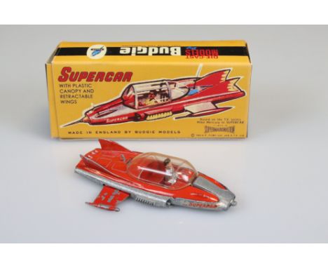 Budgie No 272 Supercar diecast model, showing play wear, with Mike Mercury figure, contained with a good reproduction box 