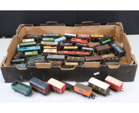 Approximately 45 OO gauge items of rolling stock featuring carriages and wagons including Hornby, Wrenn and Lima, some with d