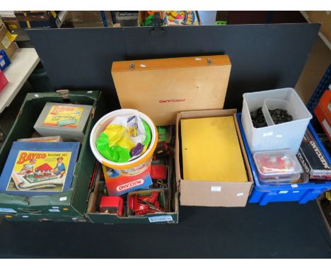 Extensive collection of Meccano parts and accessories, various colours, to include wheels, sprockets, joints, power tools etc