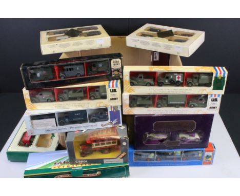 32 Boxed diecast models to include Lledo (Royal Wedding, US Army, The Home Front, etc), Corgi, Atlas Edition, etc, plus a col