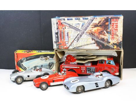 Three Western Germany JNF tin plate model cars (two friction), one with box, plus a boxed SH Japan tin plate Fire Engine, mod