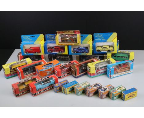 24 Boxed diecast models to include 4 x Trax, 7 x Matchbox 75 Series, Crescent No 1250 25 PDR Light Artillery, 2 x Vitesse etc