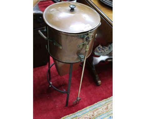 A vintage copper funnel on wrought iron stand having makers back attached (Arrow and Jackson) believed to be ex Flowers Brewe