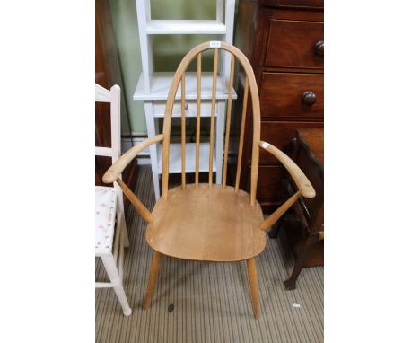 An Ercol hoop &amp; stick back armchair. 