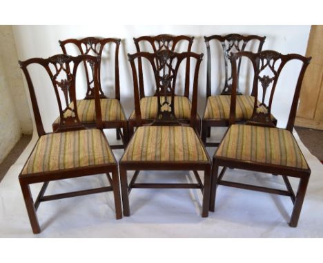 A Set of Six 19th Century Mahogany Chippendale Style Dining Chairs, each with a carved splat back above a drop in seat raised