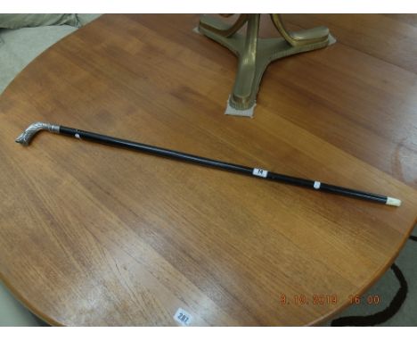 A silver plate toped walking stick