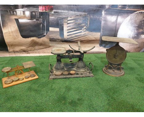 3 x various vintage scales 1 x Brass on wood with weights 1 x Black cast iron with some weights 1 x Brass postal parcel scale