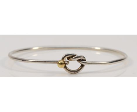 Tiffany & Co., a silver bangle with 750/18ct gold ball detail, 7gmstamped Tiffany & Co., 925 and 750