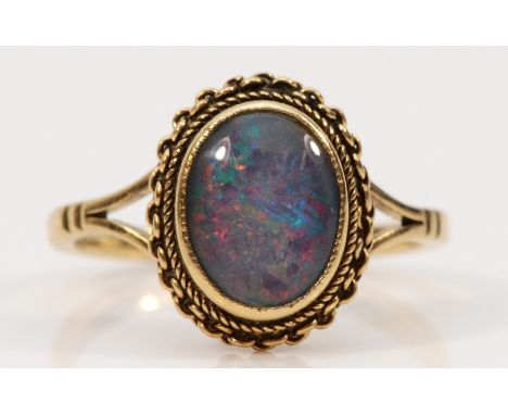 A 9ct gold opal doublet dress ring, L 1/2, 2.8g
