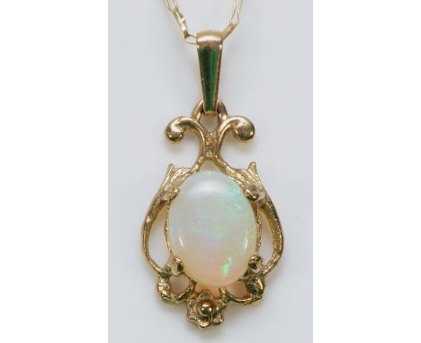 A 9ct gold opal pendant with a chain, 18mm drop, 1.9g