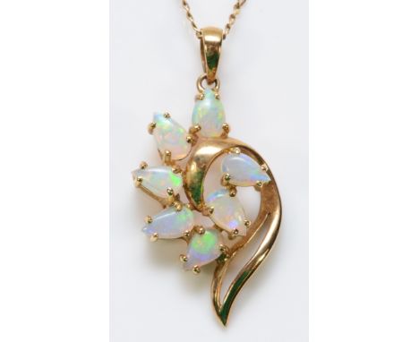 A 9ct gold opal pendant with a chain, 22mm pendant length, 2.2g