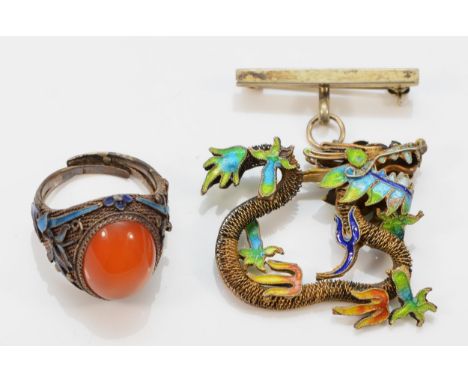 A Chinese silver gilt and enamel dragon brooch, 38 x 33mm, together with a silver, enamel and carnelian ring (2)20gm