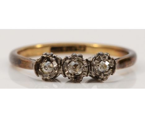 A 9ct gold and platinum old cut diamond three stone ring, O, 1.9g