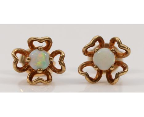 A pair of 9ct gold opal earrings with scroll backs, 1g